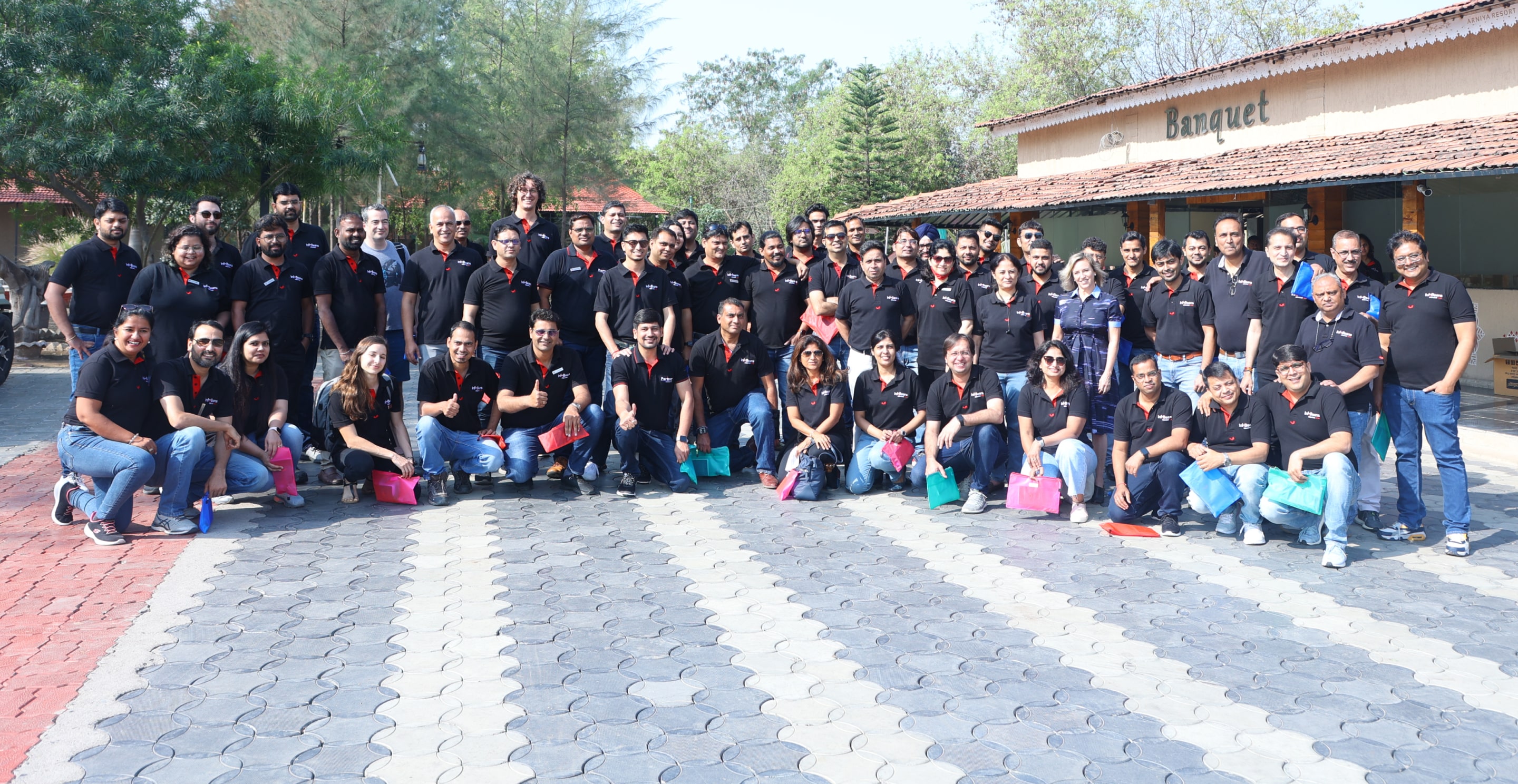 Team photo of leadership team before retreat outside